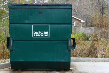 Com dumpster pad