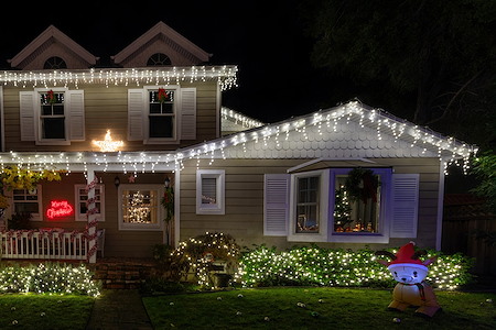 Holiday lights ladders and liability why pros handle seasonal lighting