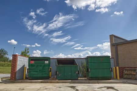 St augustine commercial dumpster pad cleaning removing oil grease and odors